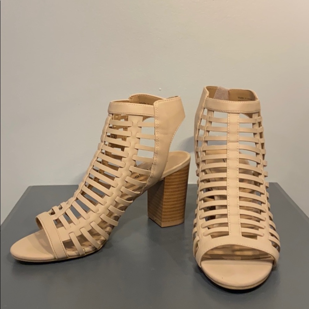 Call it Spring caged heels in a creamy nude.